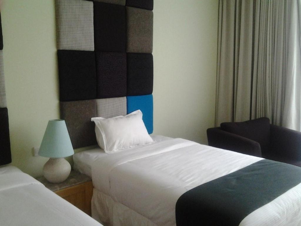 Chara Hotel Бандунг Номер фото